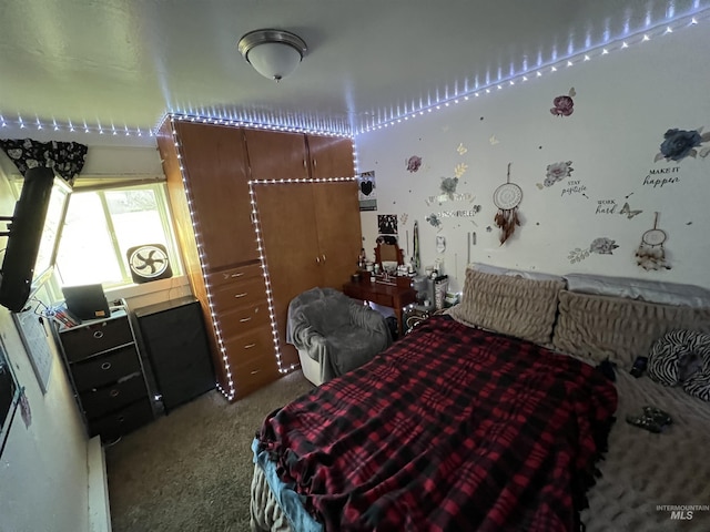 bedroom featuring light colored carpet