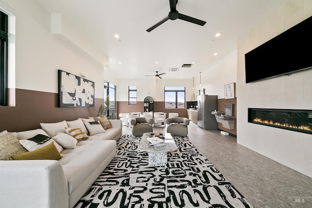 4340 E Haystack St Unit 101, Boise, ID 83716 - living area with ceiling fan, recessed lighting, and a tiled fireplace