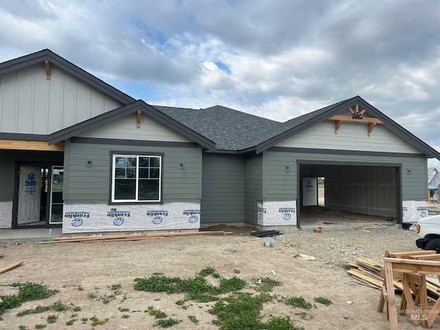 18998 Tranquil Pl, Caldwell, ID 83607 - unfinished property with an attached garage and a shingled roof