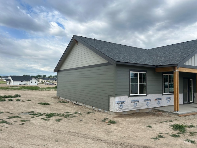 18998 Tranquil Pl, Caldwell, ID 83607 - view of home's exterior with a shingled roof