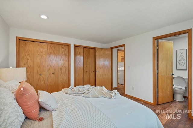 9421 W Rifleman St, Boise, ID 83703 - bedroom featuring washer / clothes dryer, multiple closets, wood finished floors, baseboards, and ensuite bath