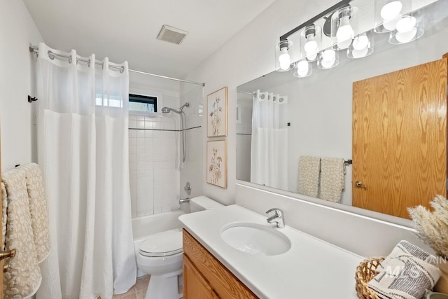 9421 W Rifleman St, Boise, ID 83703 - full bath with vanity, toilet, shower / bath combo with shower curtain, and tile patterned floors