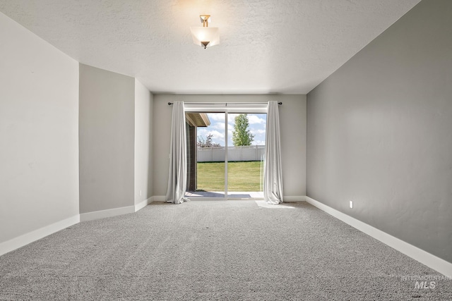 11153 W Brett Dr, Nampa, ID 83686 - carpeted empty room with a textured ceiling and baseboards