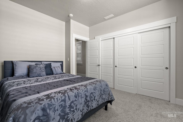 11153 W Brett Dr, Nampa, ID 83686 - carpeted bedroom with a closet, a textured ceiling, and baseboards