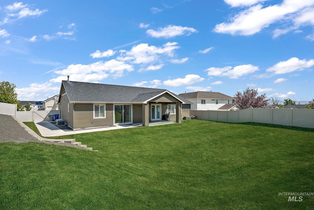 11153 W Brett Dr, Nampa, ID 83686 - rear view of house with a patio area, a shingled roof, and central air condition unit