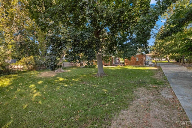 view of yard with fence