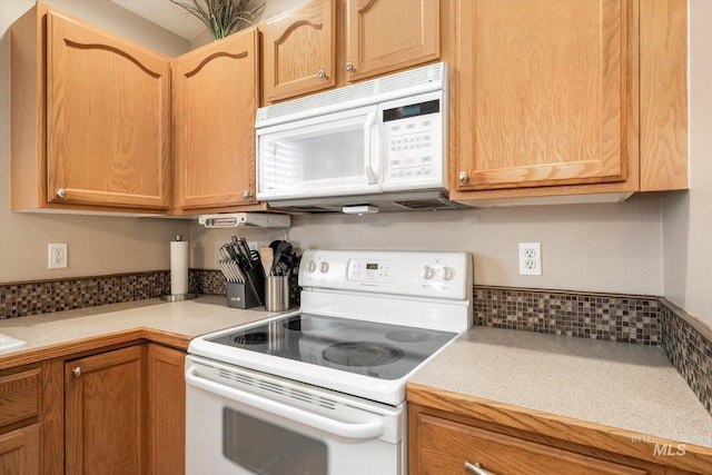 kitchen featuring white appliances