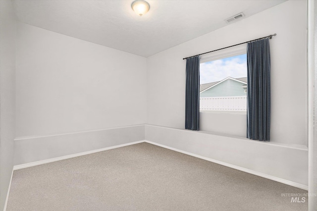 view of carpeted spare room