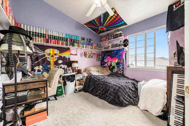 bedroom with lofted ceiling, multiple windows, and carpet flooring