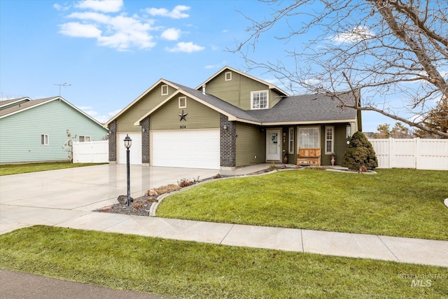 view of front of house with a garage and a front yard