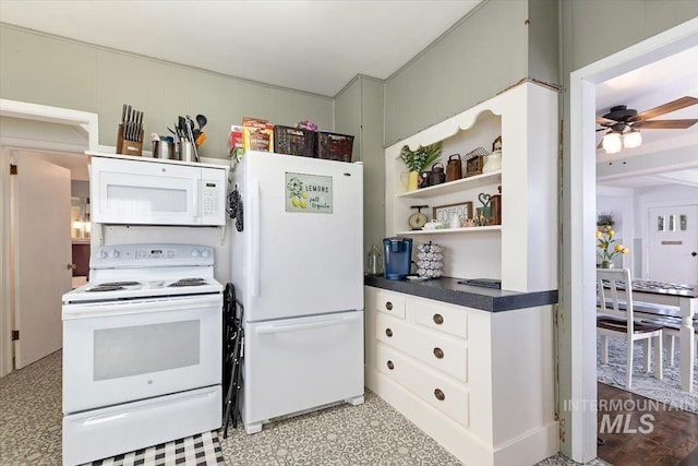 201 9th Ave N, Buhl, ID 83316 - kitchen with white appliances, open shelves, dark countertops, ceiling fan, and light floors