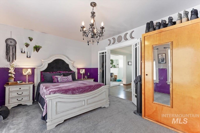 201 9th Ave N, Buhl, ID 83316 - bedroom with a chandelier and carpet floors