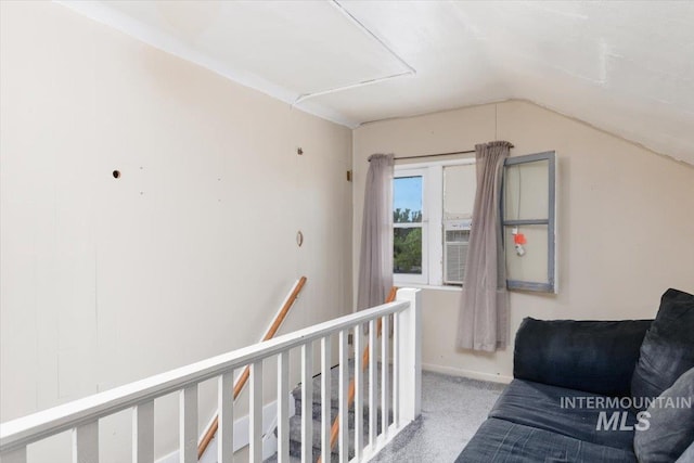 201 9th Ave N, Buhl, ID 83316 - hall with lofted ceiling, carpet flooring, an upstairs landing, and baseboards