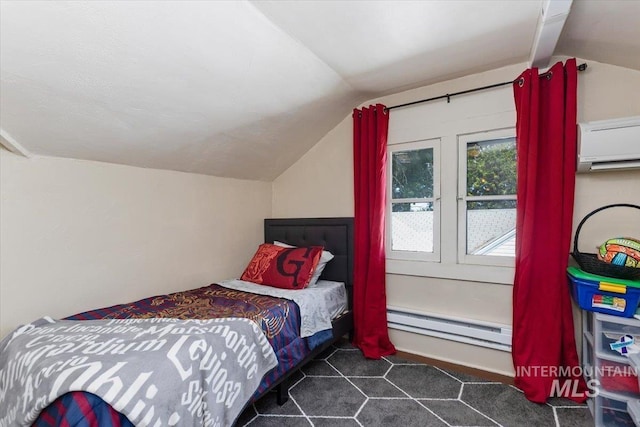 201 9th Ave N, Buhl, ID 83316 - bedroom featuring a baseboard radiator, vaulted ceiling, and a wall unit AC