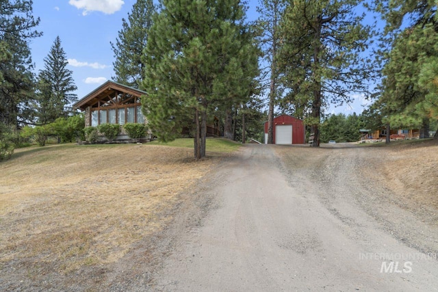 exterior space with dirt driveway