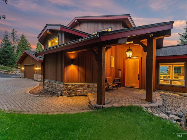 view of front of property with a garage