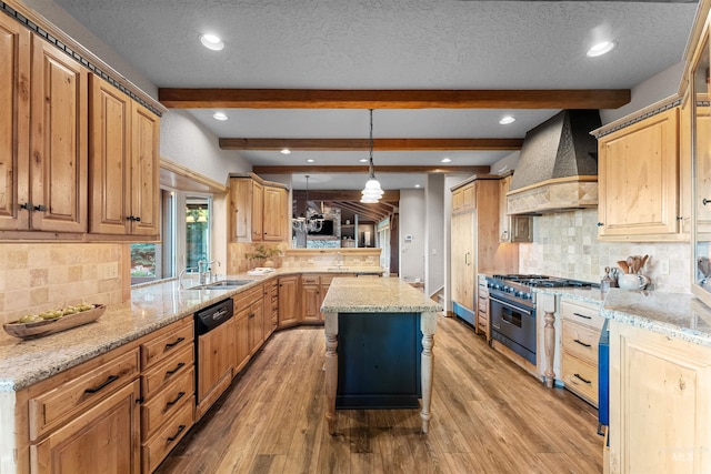 kitchen featuring dishwasher, custom range hood, hanging light fixtures, a kitchen island, and luxury stove