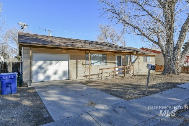 ranch-style home featuring a garage