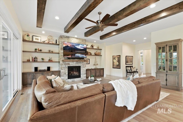 7478 W Palamas, Eagle, ID 83616 - living area with ceiling fan, light wood finished floors, recessed lighting, beamed ceiling, and a fireplace