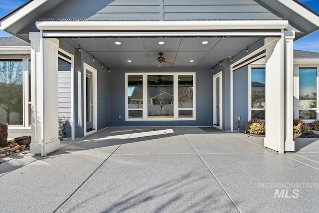 exterior space featuring ceiling fan