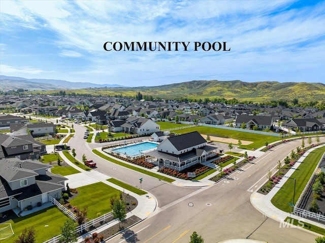 aerial view featuring a residential view and a mountain view