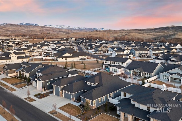 aerial view featuring a residential view and a mountain view