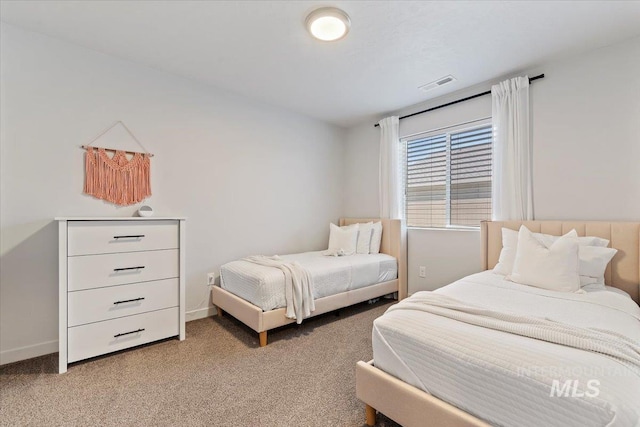 19558 Delmarva Ave, Caldwell, ID 83605 - bedroom featuring light carpet and baseboards