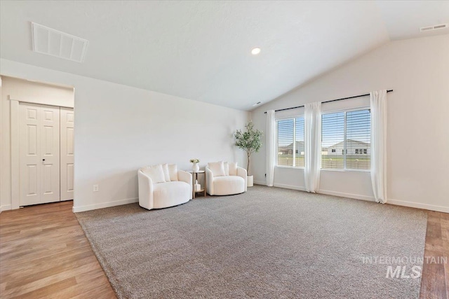 19558 Delmarva Ave, Caldwell, ID 83605 - living area featuring vaulted ceiling, light wood-style flooring, and recessed lighting
