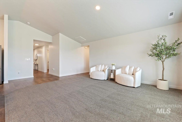 19558 Delmarva Ave, Caldwell, ID 83605 - living area featuring carpet floors, lofted ceiling, and recessed lighting