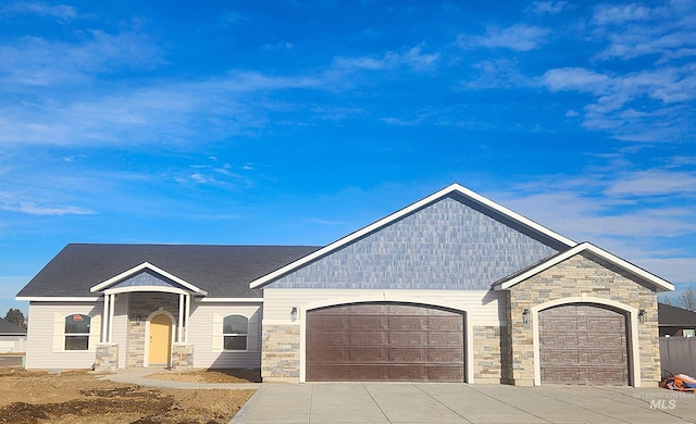 view of front of property featuring a garage