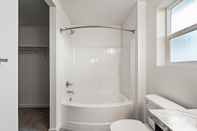 17892 Sunset Ridge Ave, Nampa, ID 83687 - full bathroom with vanity, shower / tub combination, a walk in closet, and toilet