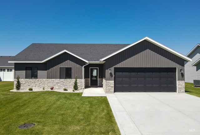 2350 Dorchester Ave, Burley, ID 83318 - ranch-style house featuring stone siding, a garage, a front lawn, board and batten siding, and central AC