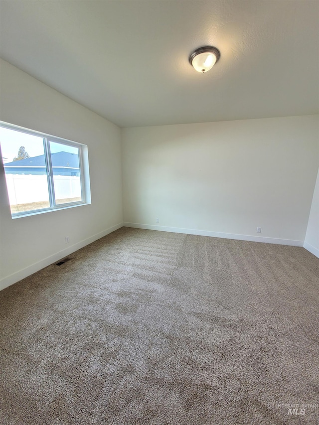 view of carpeted spare room