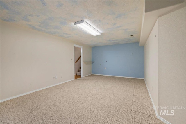 2920 S Givens Way, Meridian, ID 83642 - unfurnished room featuring carpet, stairway, and baseboards