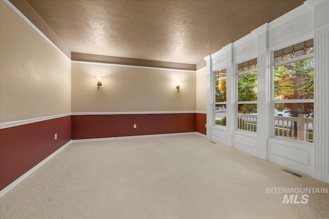 2920 S Givens Way, Meridian, ID 83642 - carpeted empty room featuring a textured ceiling and baseboards