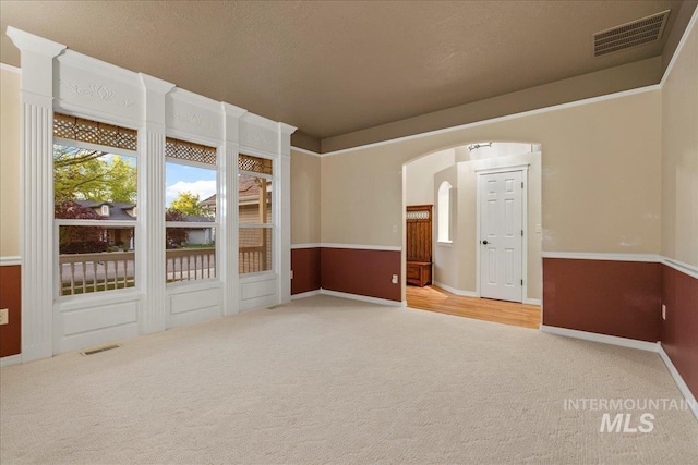 2920 S Givens Way, Meridian, ID 83642 - carpeted spare room featuring arched walkways and baseboards