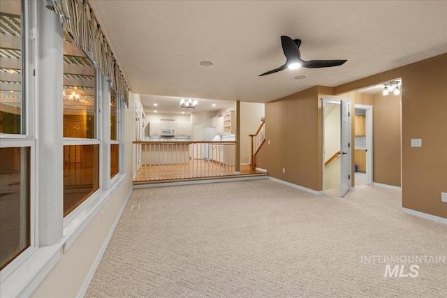 2920 S Givens Way, Meridian, ID 83642 - carpeted spare room with baseboards and ceiling fan