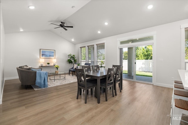 1866 W Windswept Dr, Meridian, ID 83646 - dining area with vaulted ceiling, recessed lighting, light wood-style floors, and a ceiling fan