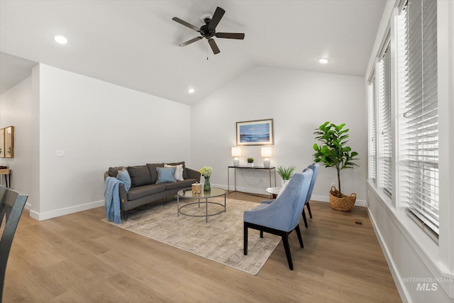 1866 W Windswept Dr, Meridian, ID 83646 - living room featuring a ceiling fan, vaulted ceiling, wood finished floors, and recessed lighting