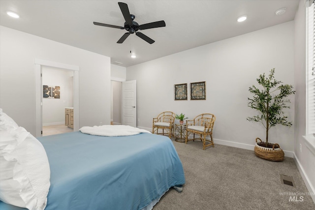 1866 W Windswept Dr, Meridian, ID 83646 - bedroom with light colored carpet, ceiling fan, ensuite bathroom, and recessed lighting