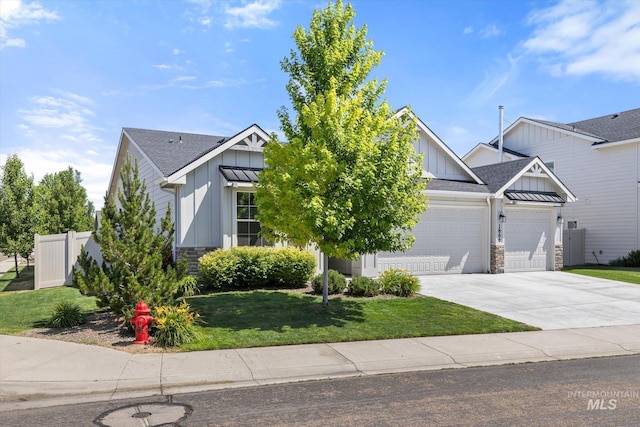 1866 W Windswept Dr, Meridian, ID 83646 - view of front facade with board and batten siding, a garage, stone siding, and a shingled roof