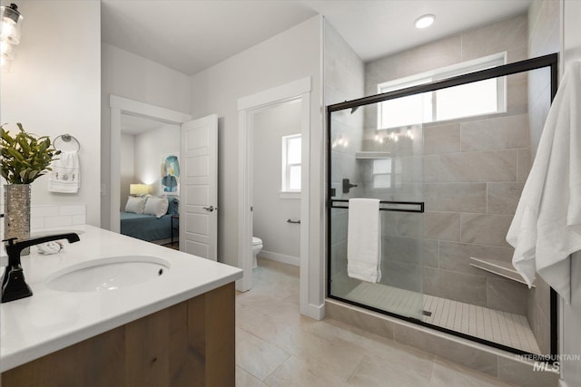 1866 W Windswept Dr, Meridian, ID 83646 - ensuite bathroom featuring vanity, a shower stall, and tile patterned flooring