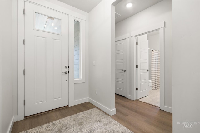 1866 W Windswept Dr, Meridian, ID 83646 - entrance foyer with wood finished floors and recessed lighting