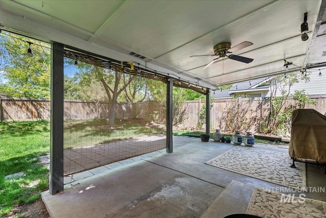 view of patio / terrace featuring a ceiling fan