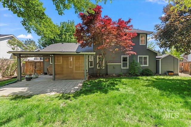 rear view of property with a patio area