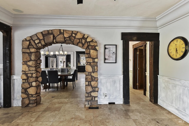 unfurnished dining area featuring a chandelier