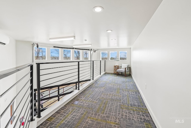 3472 N Prospect Ln, Garden City, ID 83714 - corridor featuring a wall mounted AC, baseboards, and recessed lighting