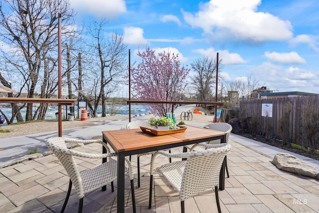 3472 N Prospect Ln, Garden City, ID 83714 - view of patio featuring outdoor dining area and fence