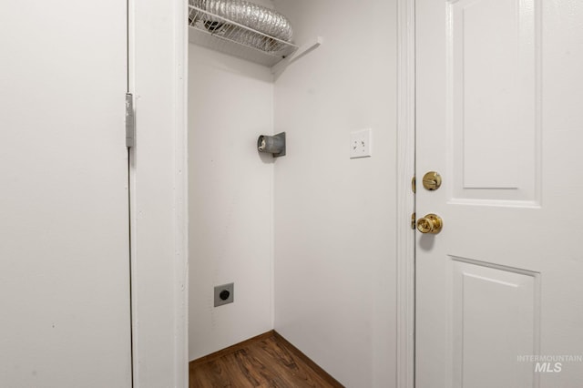 washroom featuring hookup for an electric dryer and dark wood-style flooring