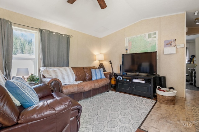 living room with a ceiling fan and lofted ceiling